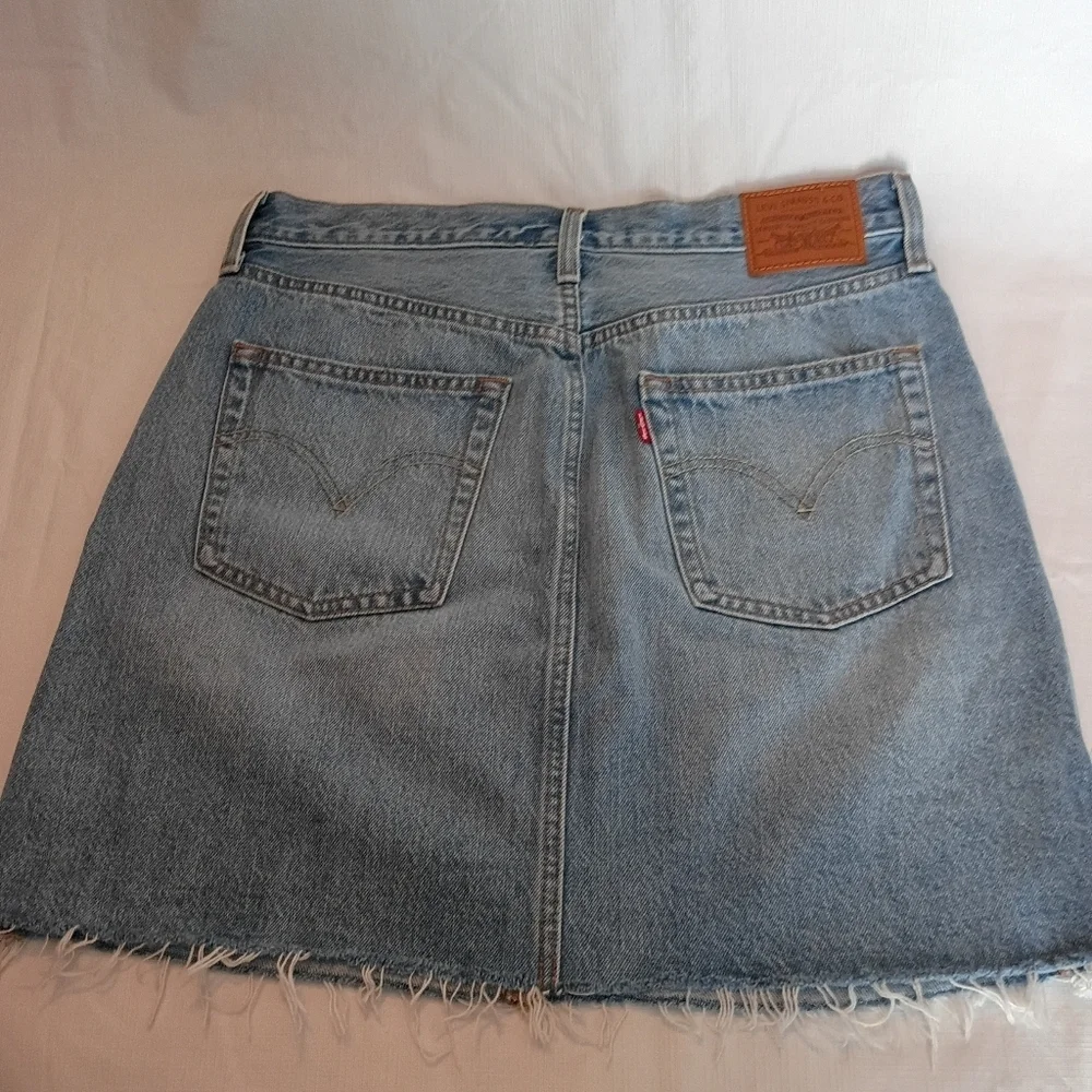 Levi’s Premium High Waisted Denim Mini Skirt Blue Light Wash Distressed Size 30